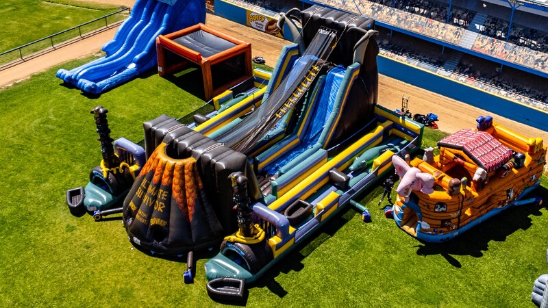 big inflatable zipline and obstacle course rental